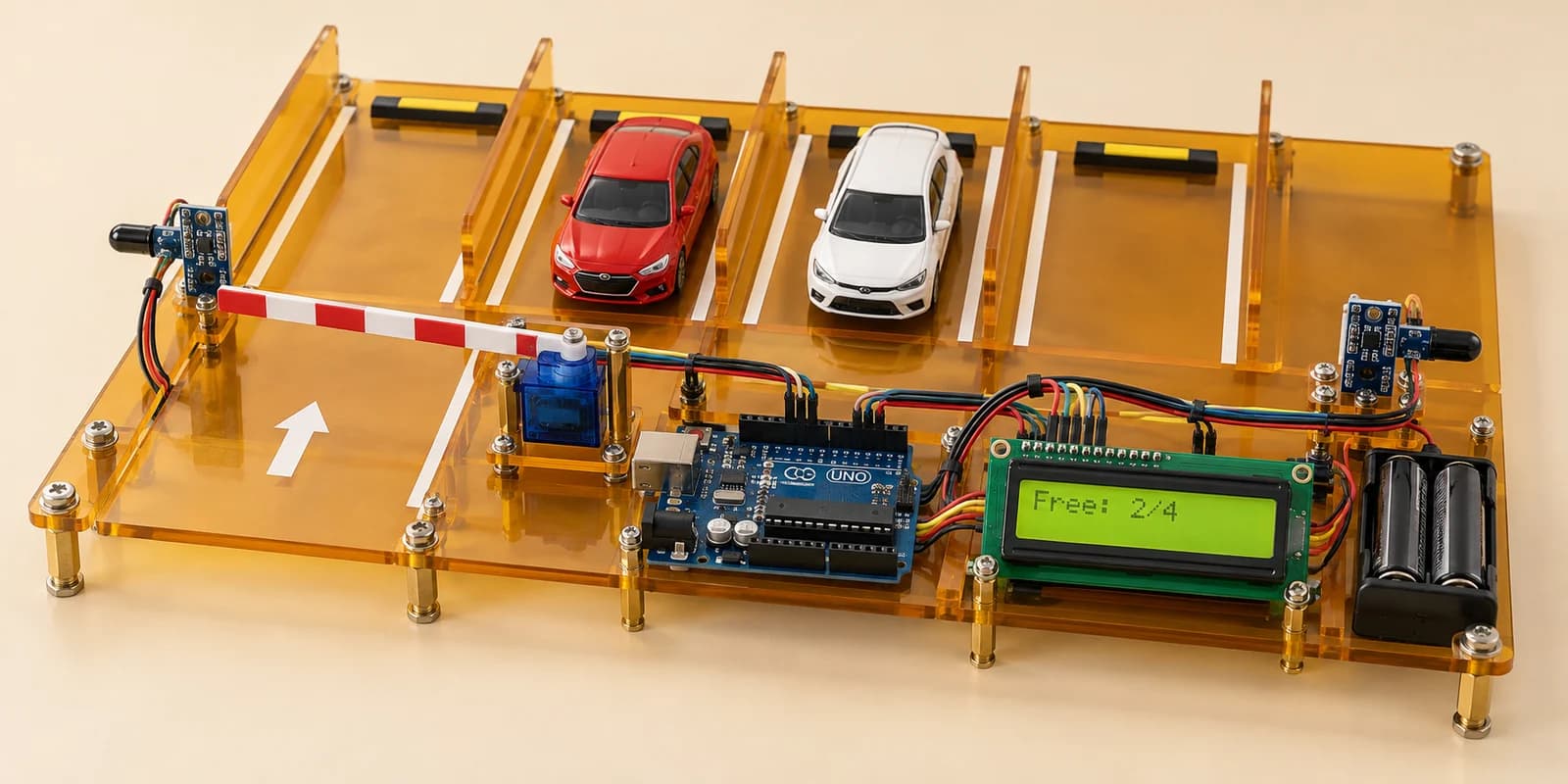 Tabletop four-space parking project with Arduino, infrared sensors, LCD and servo barrier