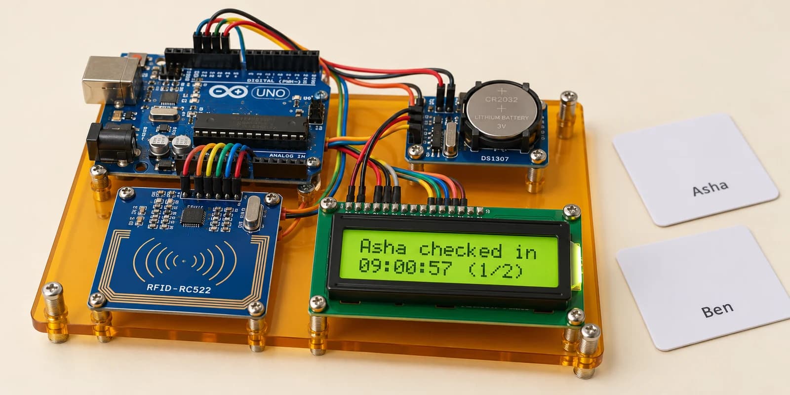 Arduino RFID attendance desk with student cards, clock module and LCD arrival time